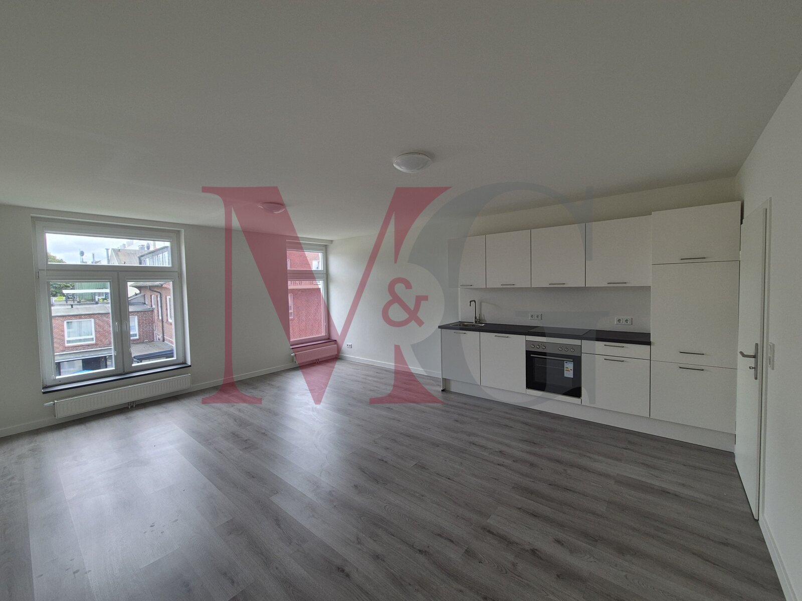 Exklusives Wohnen im historischen Schulgebäude – 2-Zimmer-Wohnung mit Stil und Geschichte