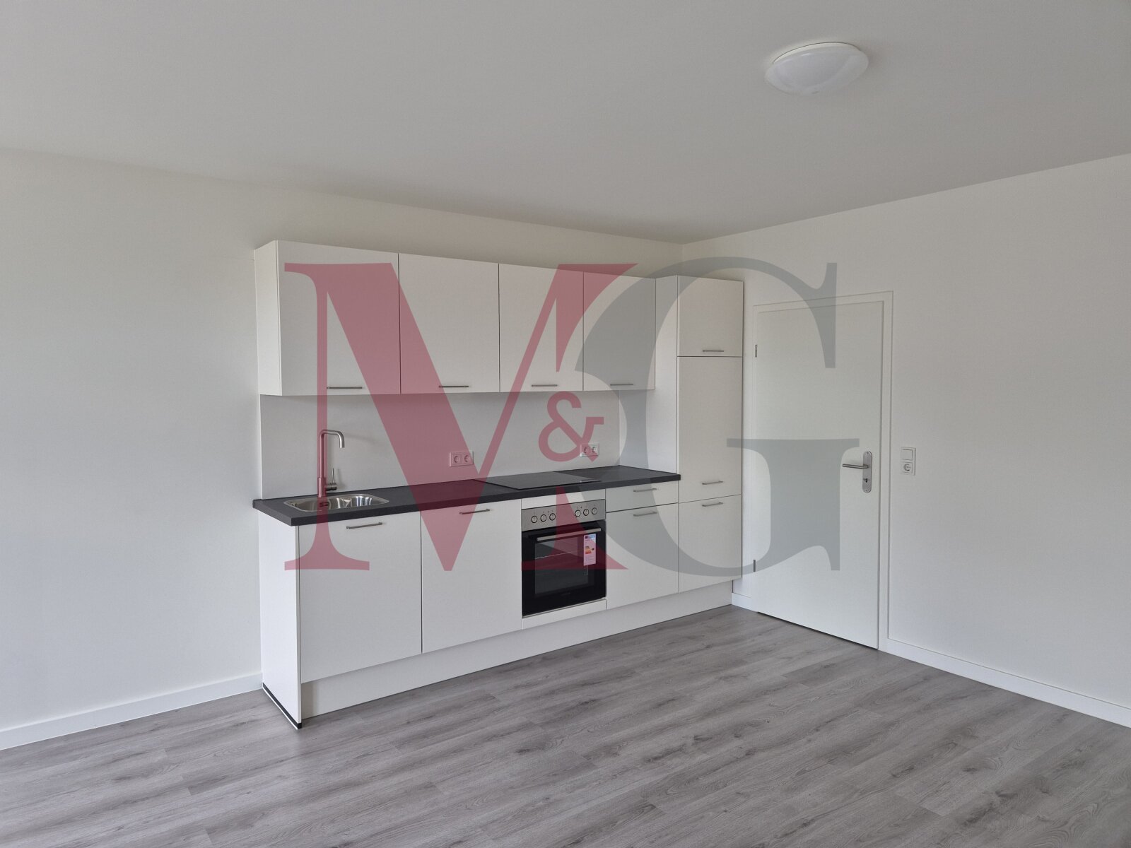 Exklusives Wohnen im historischen Schulgebäude – 2-Zimmer-Wohnung mit Stil und Geschichte