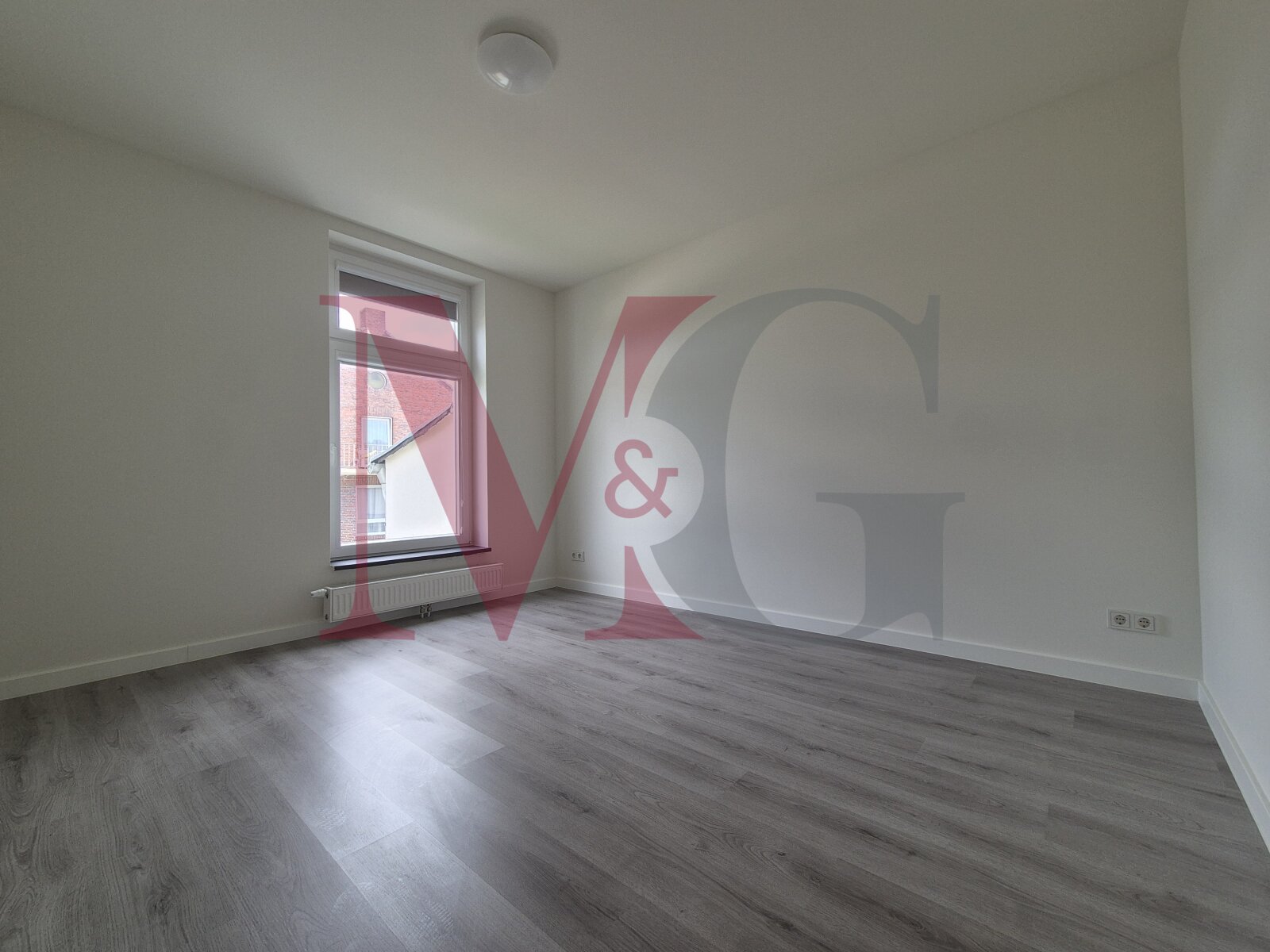 Exklusives Wohnen im historischen Schulgebäude – 2-Zimmer-Wohnung mit Stil und Geschichte