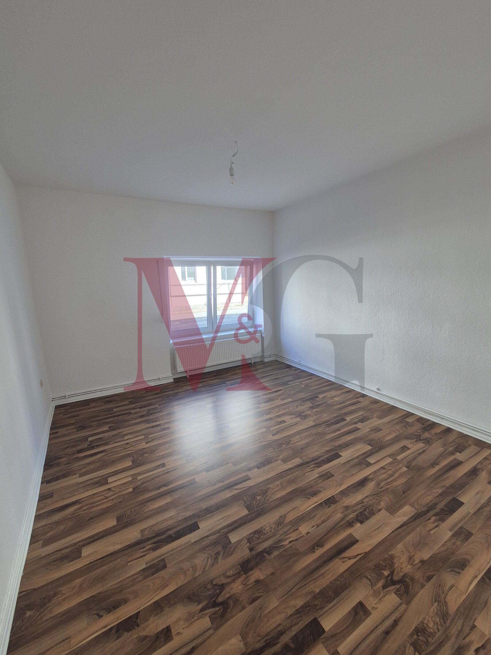 3 - Zimmer Erdgeschosswohnung in zentraler Lage